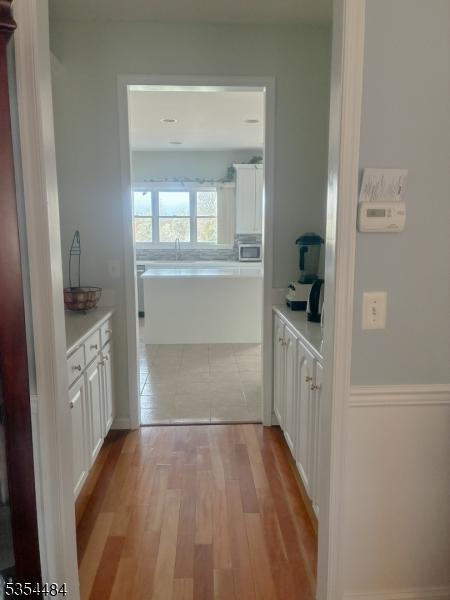 hall featuring light wood finished floors