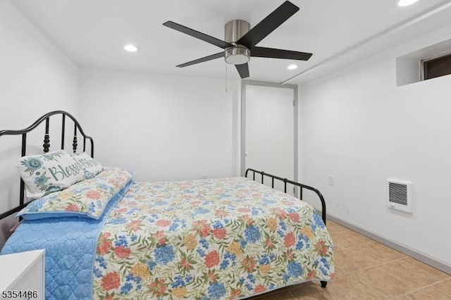 bedroom with recessed lighting, heating unit, ceiling fan, and tile patterned floors