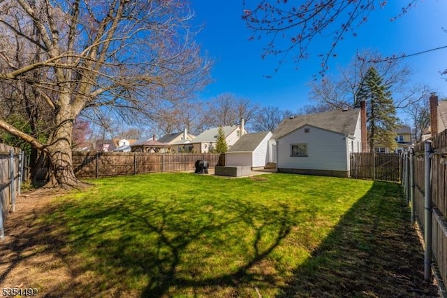 view of yard featuring a patio and a fenced backyard