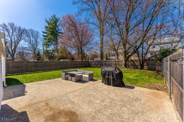 view of patio featuring a fenced backyard and outdoor lounge area