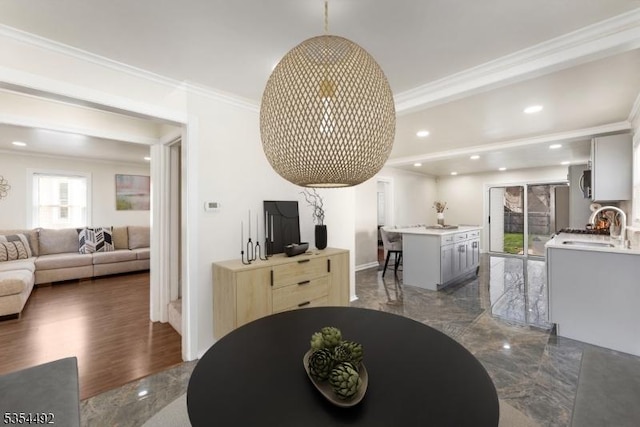 dining space with ornamental molding, recessed lighting, and marble finish floor