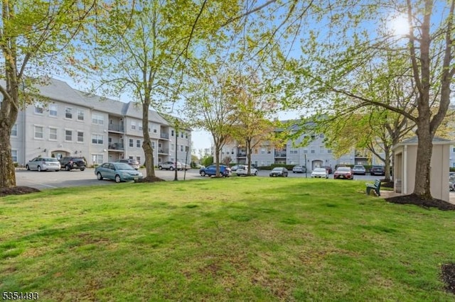 view of yard with a residential view