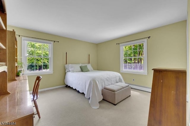 21 Dorset Rd, Washington Twp, NJ 07853 - bedroom featuring baseboard heating, carpet floors, and baseboards