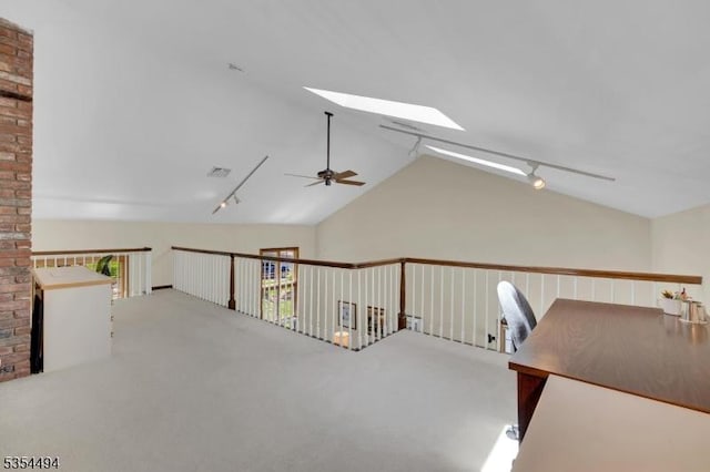 21 Dorset Rd, Washington Twp, NJ 07853 - corridor featuring track lighting, a skylight, carpet floors, and vaulted ceiling