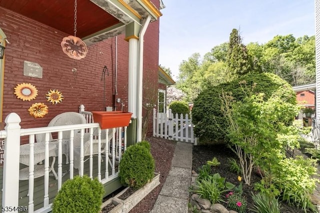 view of home's exterior with fence