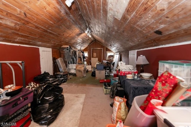 additional living space with wood ceiling, concrete floors, and lofted ceiling