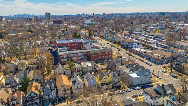 birds eye view of property with a city view