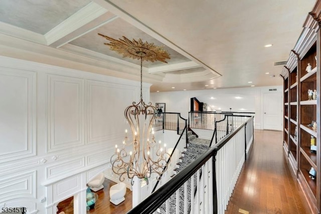 26 Avon Rd, Warren Twp, NJ 07059 - hallway with a chandelier, hardwood / wood-style floors, ornamental molding, and an upstairs landing