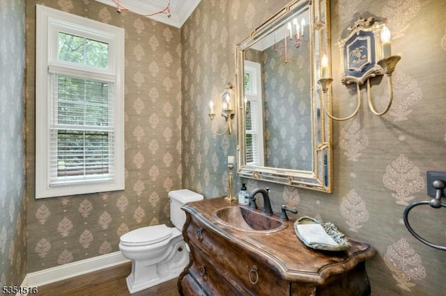 26 Avon Rd, Warren Twp, NJ 07059 - half bath with wood finished floors, vanity, baseboards, wallpapered walls, and toilet