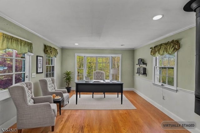 office space featuring crown molding, recessed lighting, baseboards, and wood finished floors