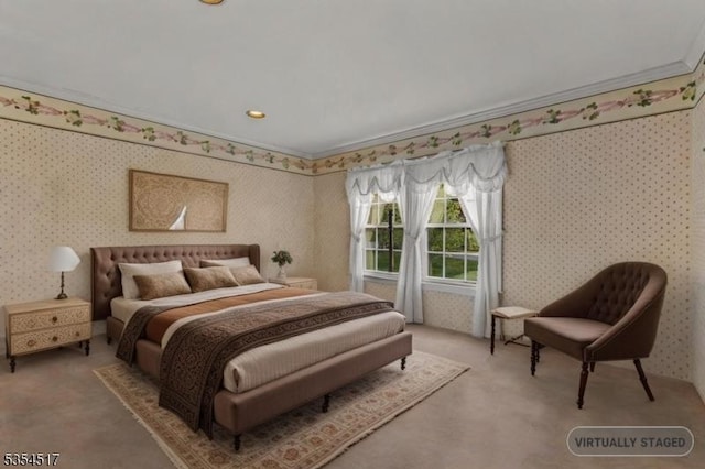 bedroom with carpet floors, wallpapered walls, and crown molding