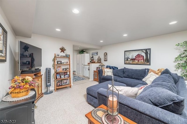 carpeted living room with recessed lighting