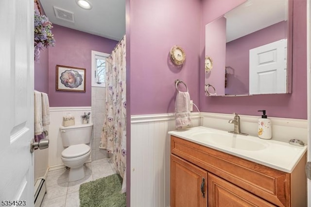 bathroom with a wainscoted wall, vanity, toilet, and visible vents