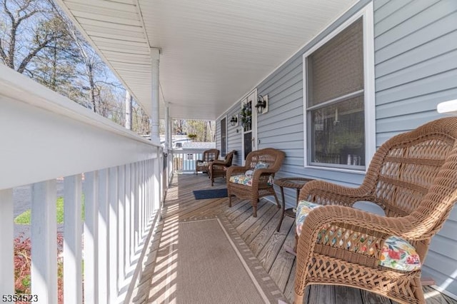 wooden terrace with covered porch