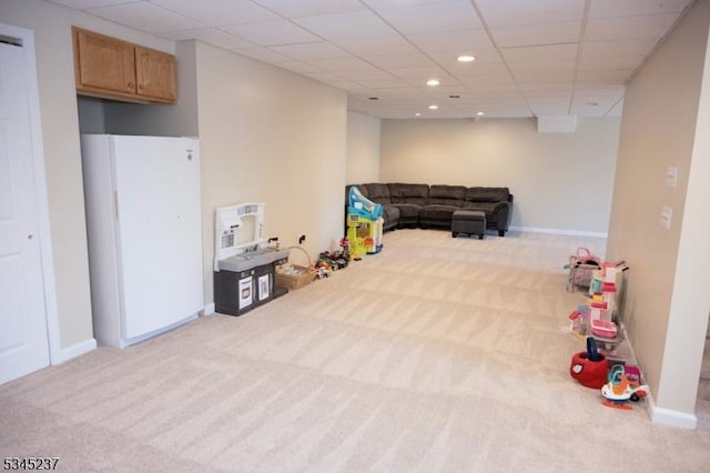 playroom with carpet floors, baseboards, recessed lighting, and a paneled ceiling