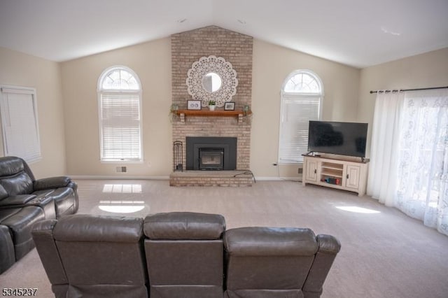 living area featuring visible vents, a brick fireplace, baseboards, carpet flooring, and vaulted ceiling
