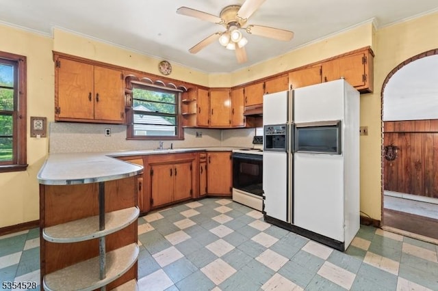 226 Wilson Rd, Franklin Twp, NJ 08873 - kitchen with light floors, light countertops, electric range oven, and white fridge with ice dispenser