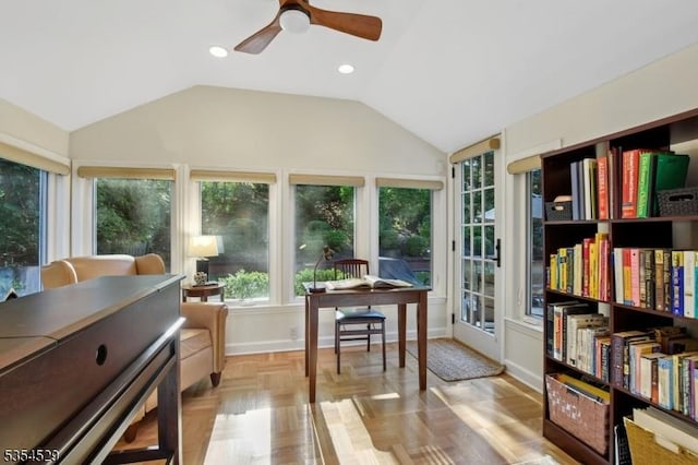 sunroom featuring vaulted ceiling