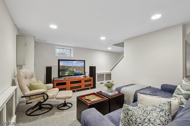 living room with carpet floors and recessed lighting