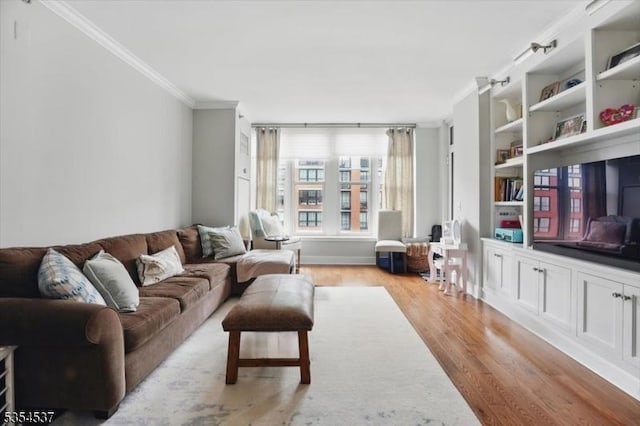1125 Maxwell Ln Unit 908, Hoboken City, NJ 07030 - living room featuring crown molding and light wood-type flooring