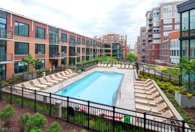 1125 Maxwell Ln Unit 908, Hoboken City, NJ 07030 - view of swimming pool featuring fence