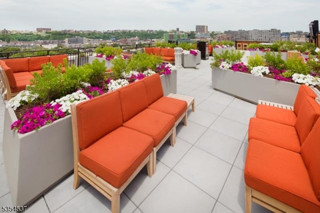 1125 Maxwell Ln Unit 908, Hoboken City, NJ 07030 - view of patio / terrace with an outdoor hangout area and a view of city
