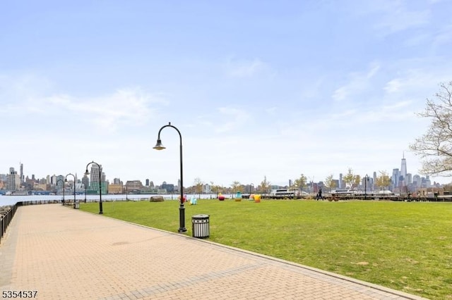 1125 Maxwell Ln Unit 908, Hoboken City, NJ 07030 - surrounding community featuring a yard and a skyline view