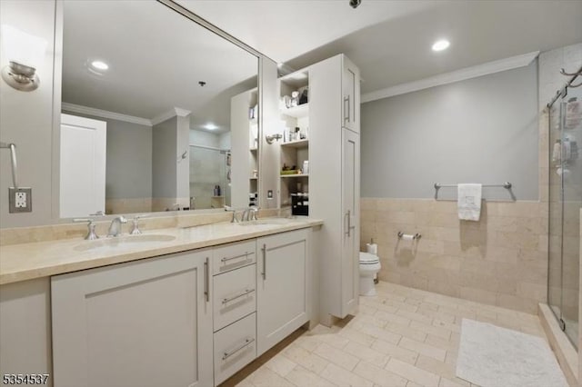1125 Maxwell Ln Unit 908, Hoboken City, NJ 07030 - bathroom with ornamental molding, a shower stall, double vanity, recessed lighting, and toilet