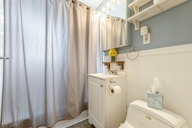 bathroom featuring toilet and a sink