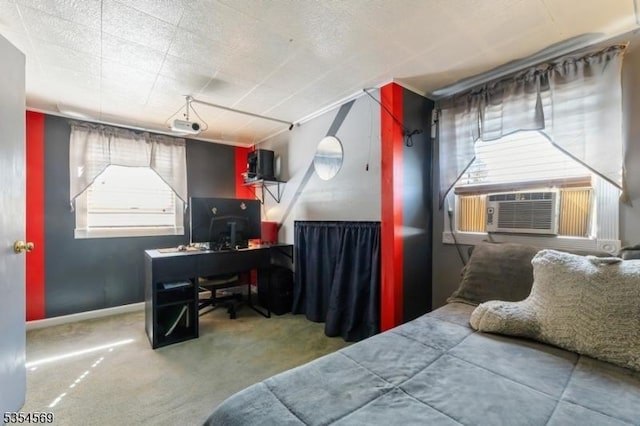 bedroom featuring carpet and cooling unit