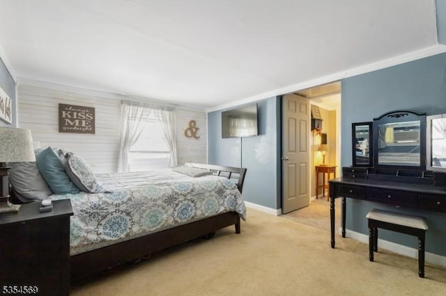 carpeted bedroom with baseboards
