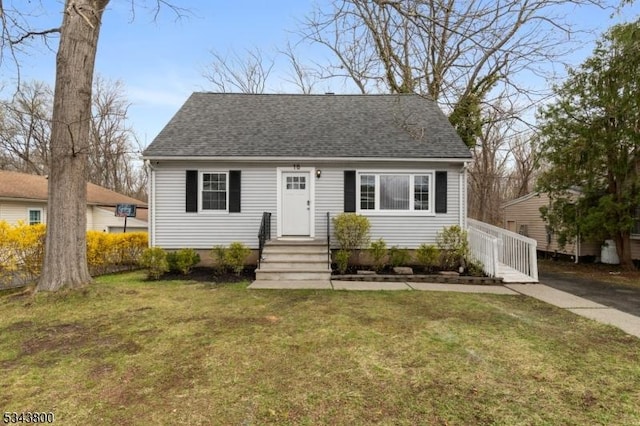 18 Lake Shore Dr, Parsippany-Troy Hills Twp, NJ 07034 - cape cod-style house featuring roof with shingles and a front yard