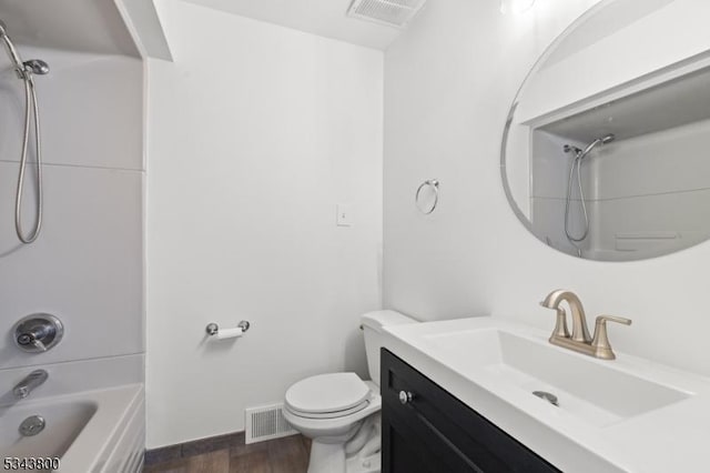 18 Lake Shore Dr, Parsippany-Troy Hills Twp, NJ 07034 - bathroom with toilet, visible vents, wood finished floors, and bathtub / shower combination