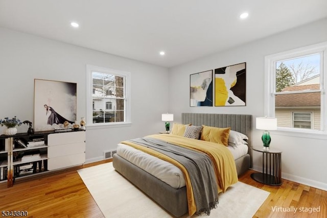 18 Lake Shore Dr, Parsippany-Troy Hills Twp, NJ 07034 - bedroom with baseboards, recessed lighting, wood finished floors, and visible vents