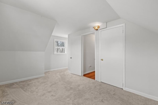 18 Lake Shore Dr, Parsippany-Troy Hills Twp, NJ 07034 - additional living space featuring baseboards, carpet, and lofted ceiling