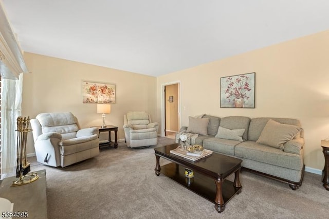 carpeted living room with baseboards