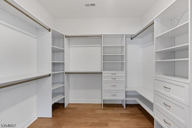 walk in closet featuring light wood-type flooring