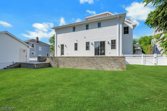 back of property with a patio