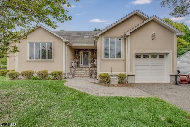 34 Hunter St, Roxbury Twp, NJ 07876 - tri-level home featuring stucco siding, a front yard, asphalt driveway, and a garage