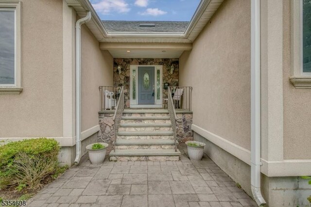 34 Hunter St, Roxbury Twp, NJ 07876 - entrance to property featuring stucco siding