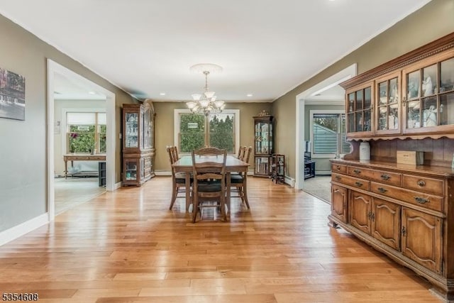34 Hunter St, Roxbury Twp, NJ 07876 - dining room with a chandelier, light wood-style flooring, recessed lighting, baseboards, and crown molding
