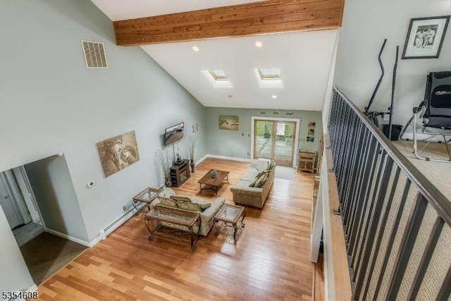 34 Hunter St, Roxbury Twp, NJ 07876 - living area featuring a skylight, wood finished floors, beam ceiling, baseboards, and recessed lighting
