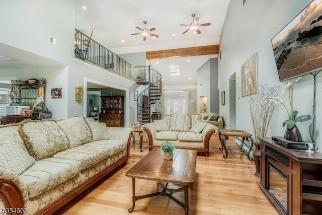 34 Hunter St, Roxbury Twp, NJ 07876 - living area with stairs, a ceiling fan, light wood-style floors, recessed lighting, and a high ceiling