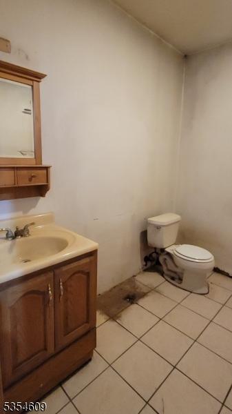 12 Ridge Rd, Andover Twp, NJ 07860 - bathroom featuring vanity, tile patterned flooring, and toilet