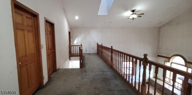 12 Ridge Rd, Andover Twp, NJ 07860 - hallway featuring lofted ceiling with skylight and an upstairs landing