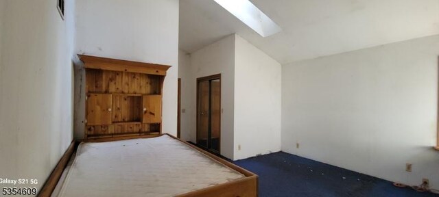 12 Ridge Rd, Andover Twp, NJ 07860 - interior space with visible vents and vaulted ceiling with skylight
