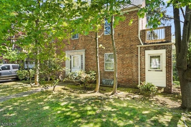 630 Ridgewood Rd, Maplewood Twp, NJ 07040 - view of side of property with a yard and brick siding