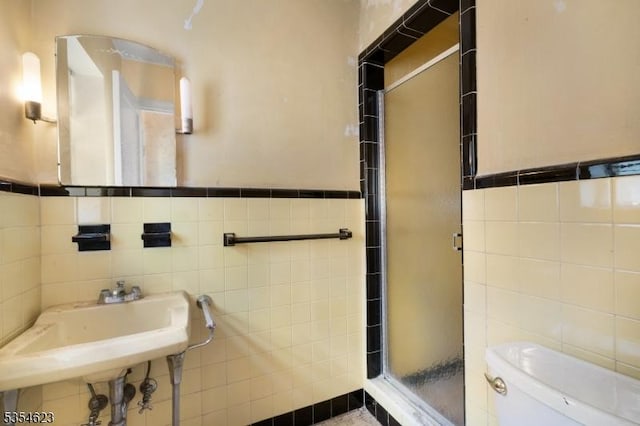630 Ridgewood Rd, Maplewood Twp, NJ 07040 - full bath with toilet, tile walls, a sink, and a stall shower