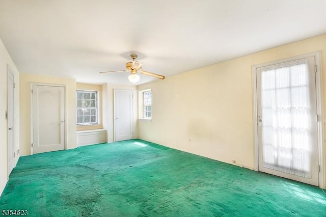 630 Ridgewood Rd, Maplewood Twp, NJ 07040 - unfurnished bedroom with carpet floors and a ceiling fan