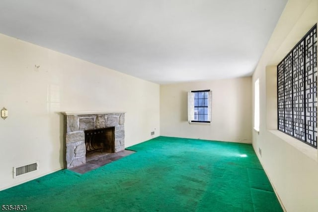 630 Ridgewood Rd, Maplewood Twp, NJ 07040 - unfurnished living room with a fireplace, carpet, and visible vents